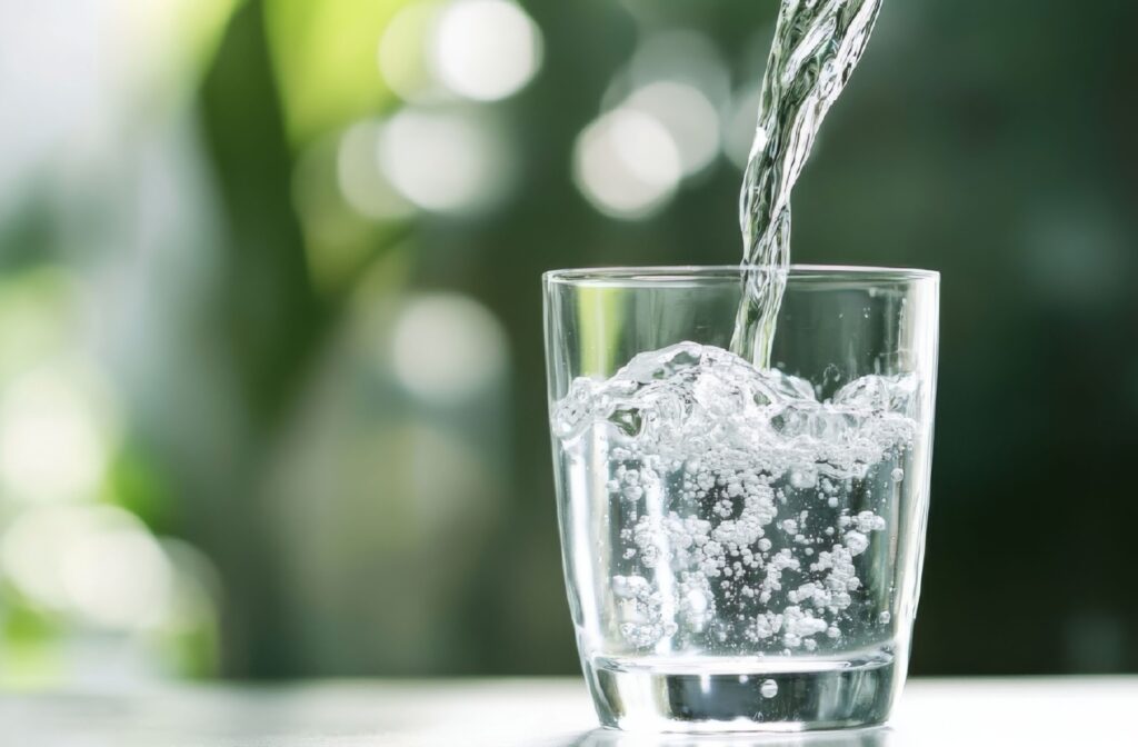 Water being poured into a clear glass