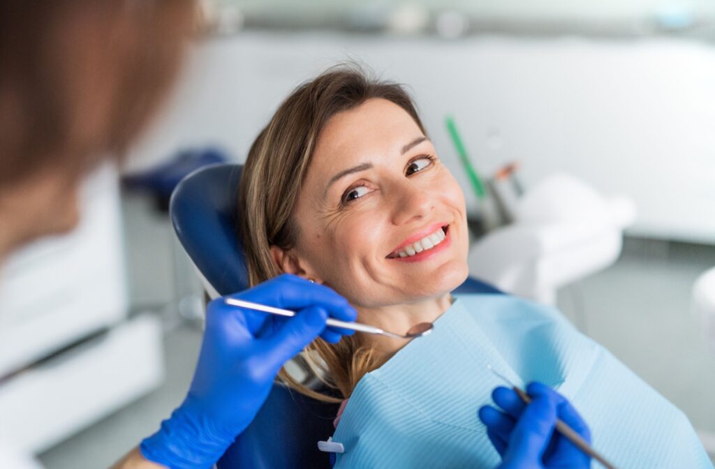 A patient at the dentist for a dental exam and cleaning.
